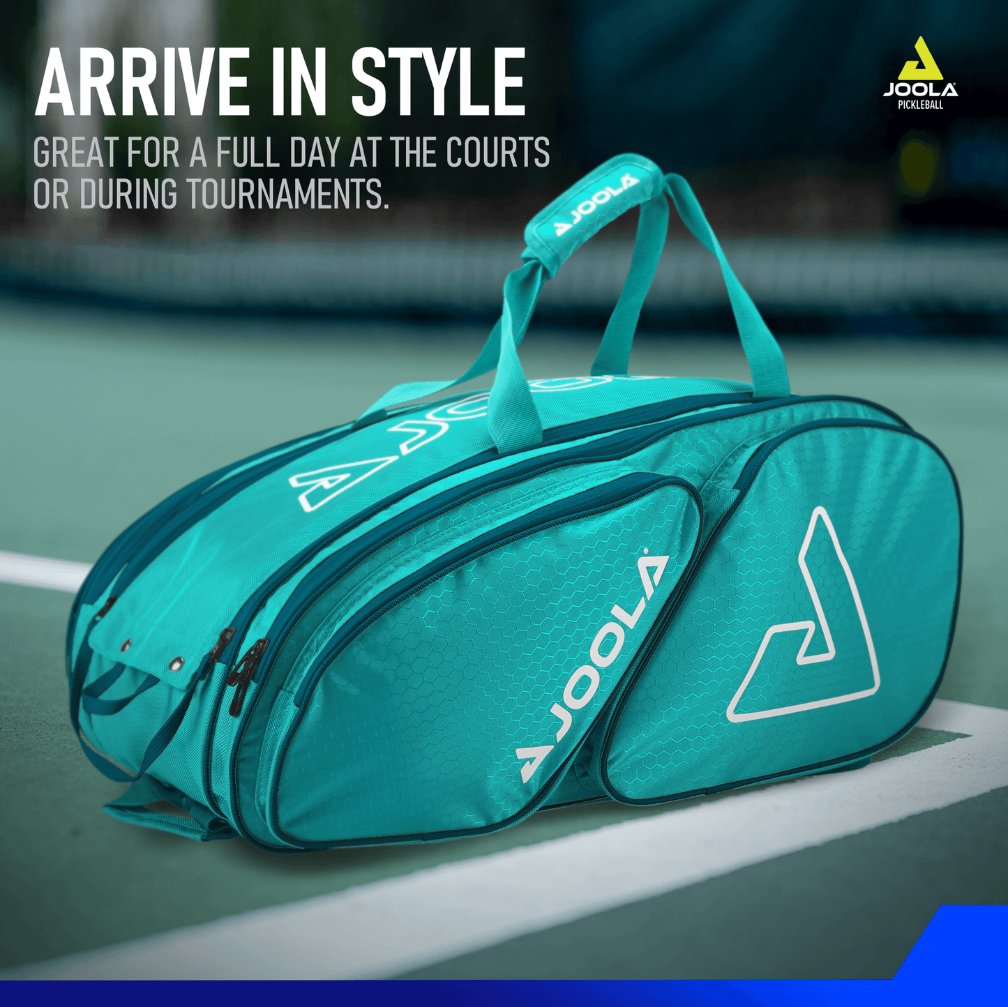 A teal JOOLA Tour Elite Pickleball Bag sits on a tennis court, with white text above saying "ARRIVE IN STYLE" and smaller text below reading "Great for a full day at the courts or during tournaments." The versatile bag features thermal-lined paddle compartments. The Pickleball Zone logo is visible on the bag and in the top right corner of the image.