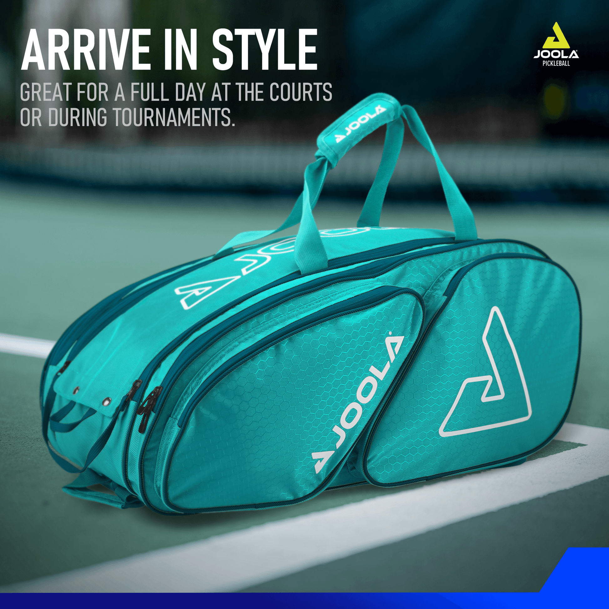 A teal JOOLA Tour Elite Pickleball Bag sits on a tennis court, with white text above saying "ARRIVE IN STYLE" and smaller text below reading "Great for a full day at the courts or during tournaments." The versatile bag features thermal-lined paddle compartments. The Pickleball Zone logo is visible on the bag and in the top right corner of the image.