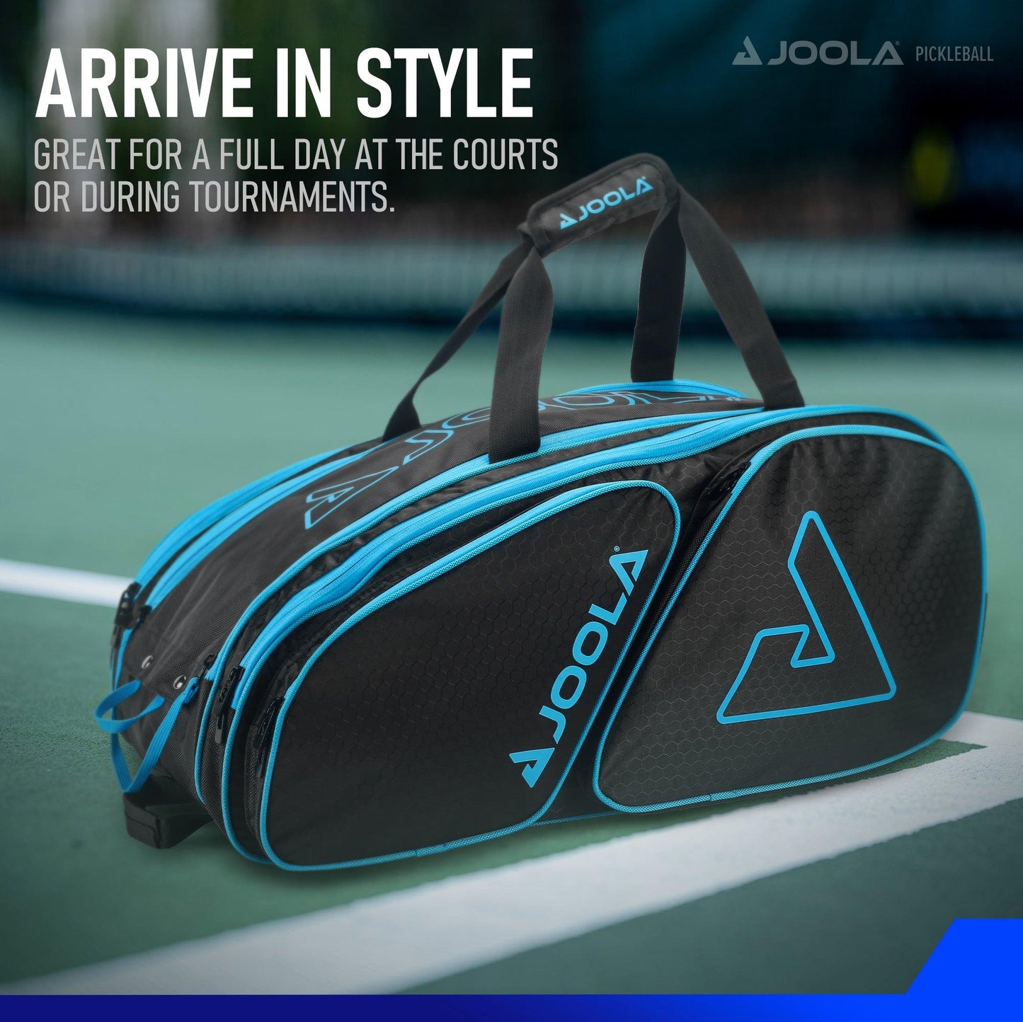 A JOOLA Tour Elite Pickleball Bag with padded carry handles is prominently displayed on a tennis court. The black and blue design features the Pickleball Zone logo and branding. Thermal-lined paddle compartments protect your gear. Text overlay reads: "Arrive in Style. Great for a full day at the courts or during tournaments.