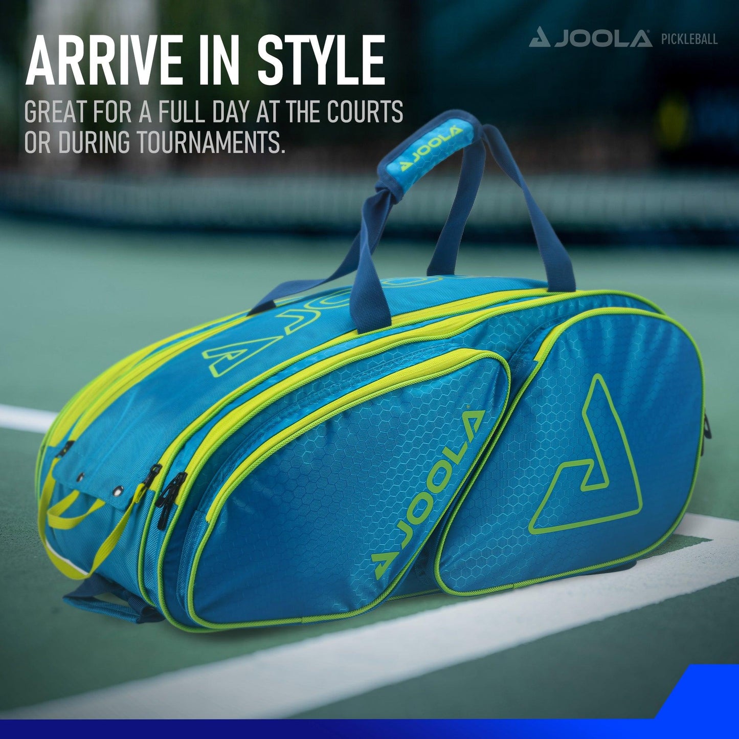A blue and green Pickleball Zone JOOLA Tour Elite Pickleball Bag with multiple thermal-lined paddle compartments sits on a pickleball court. The text reads, "ARRIVE IN STYLE. Great for a full day at the courts or during tournaments.