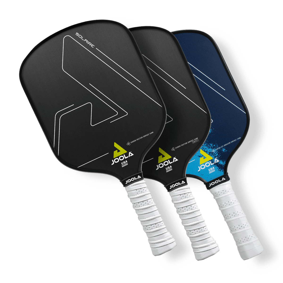 Three Joola pickleball paddles are displayed, overlapping in a fan arrangement. Each paddle has a white grip handle and a distinct design on the face, featuring minimalistic lines and logo accents in colors like black and blue.